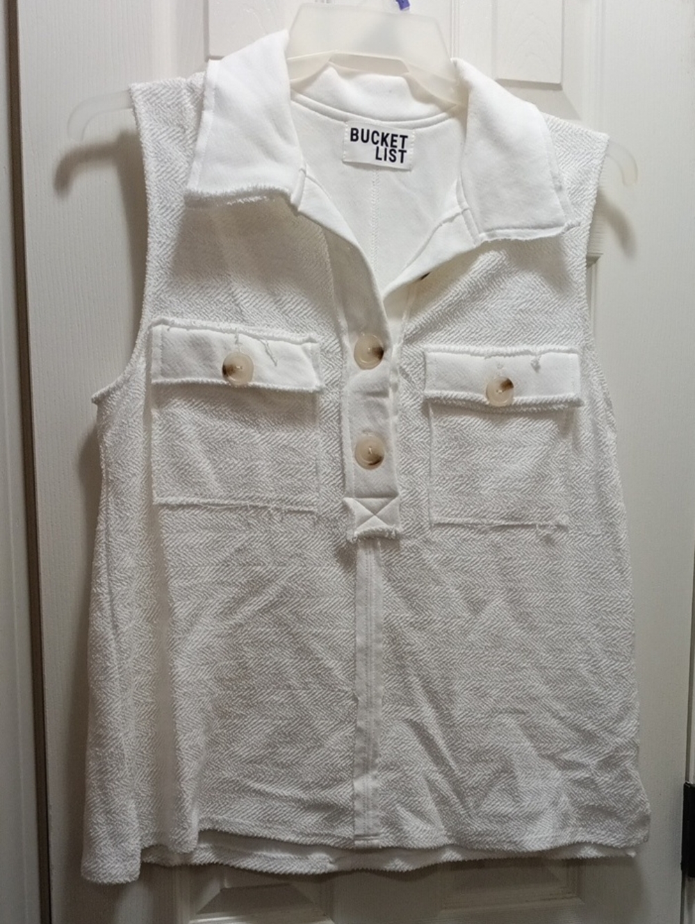 BUCKETLIST White Textured Sleeveless Collared Tank with Button Pockets